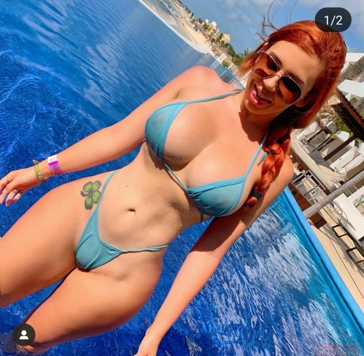 Redhead bikini sucks fan photos